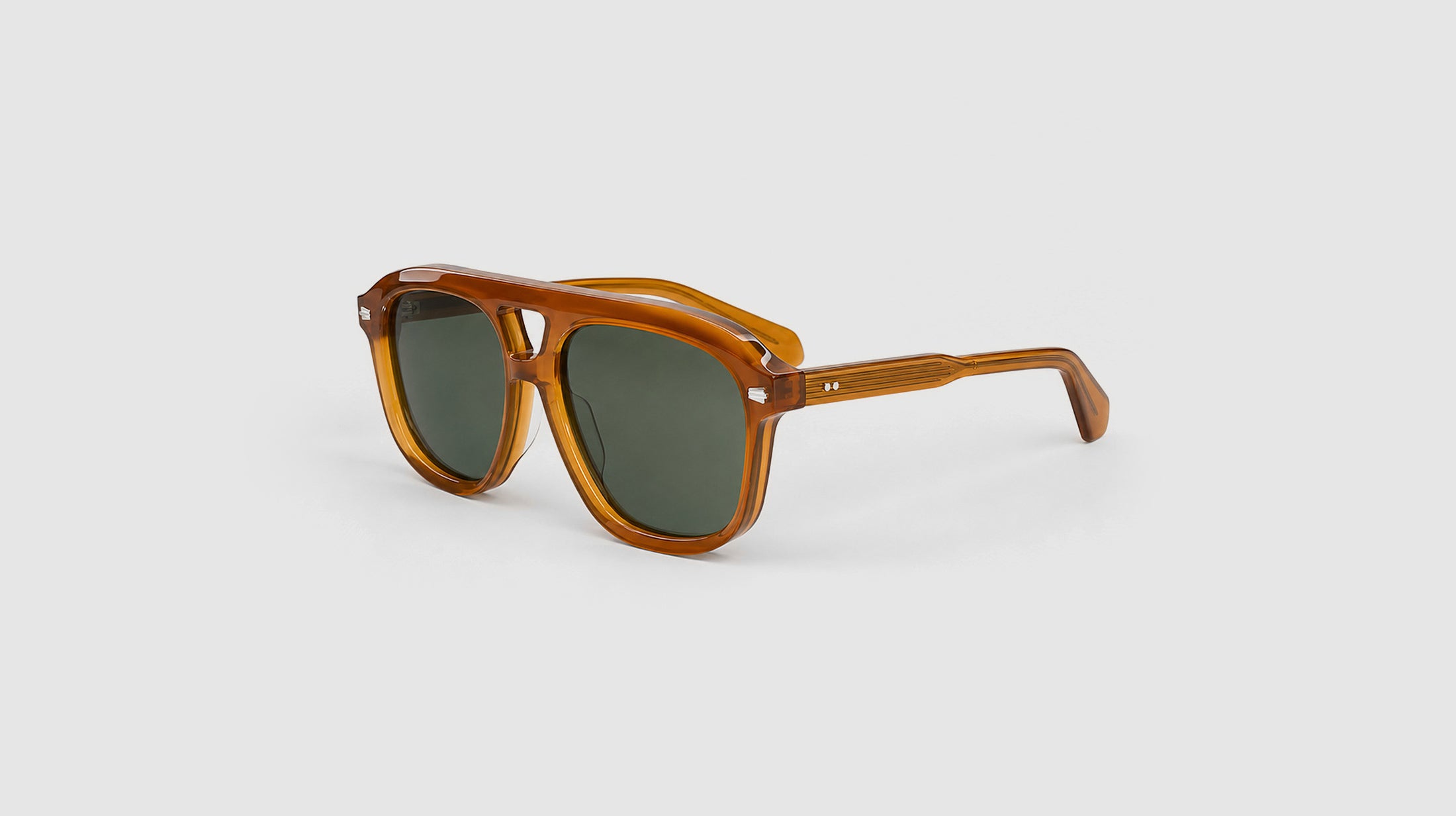 hero_3q__16_CAPRI_orange_with_green_dark_lens_hero_3q_final_1.jpg